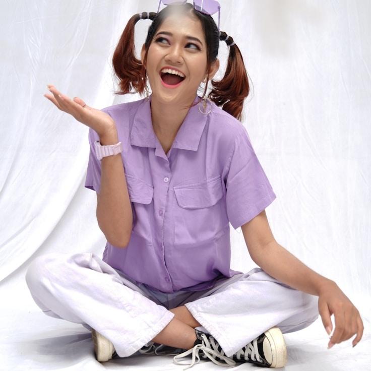 Maya Rao, Lead Design Curator at FieldVistaAtlas, reviewing corporate floral arrangements